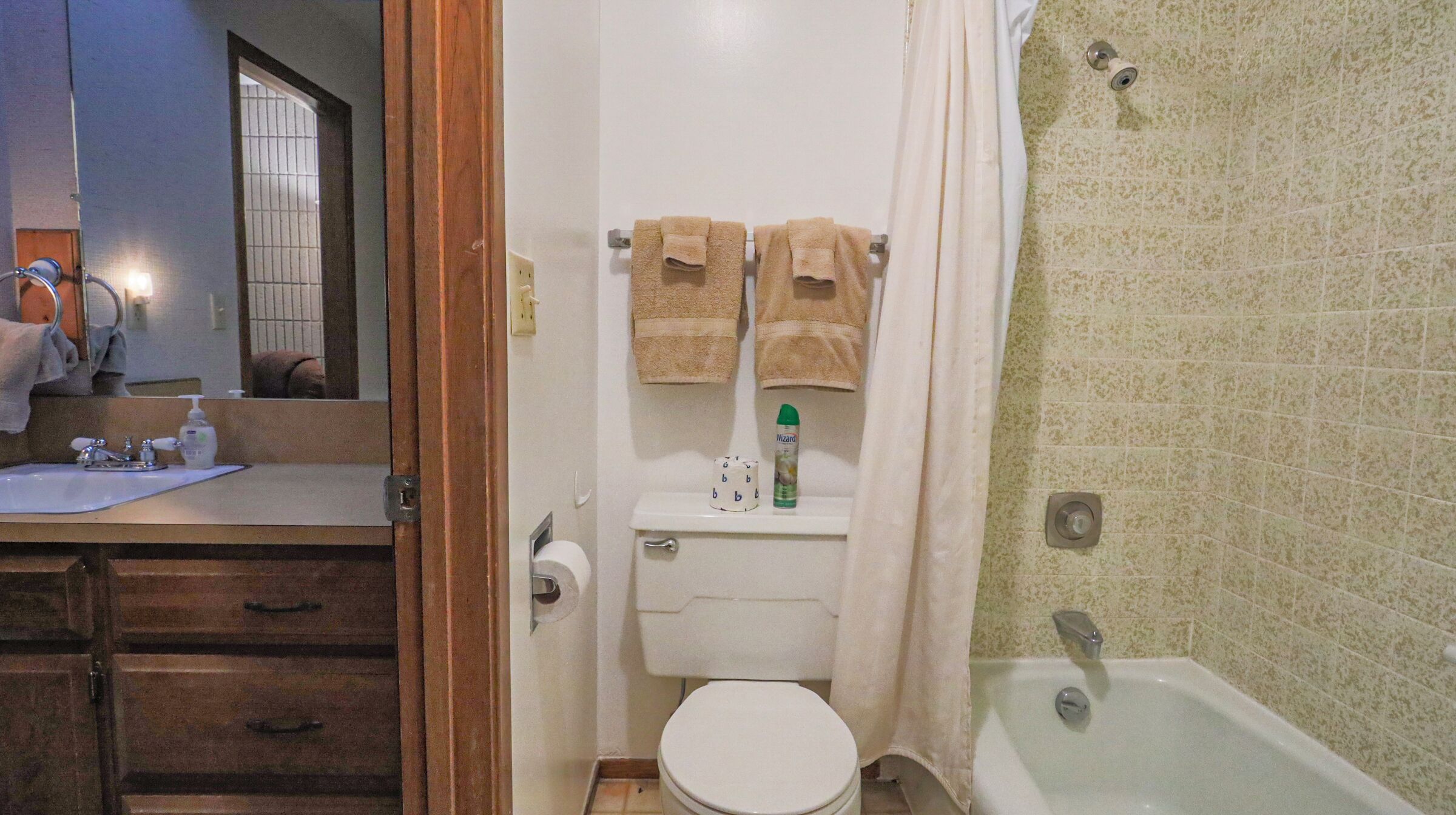 Hair dryer, towels, soap, toilet paper
