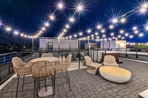 Outdoor dining - Stylish 3BR Nash Escape | Hot Tub + Skyline Views! (Nashville)