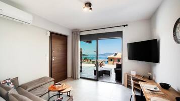 Apartamento luxo, vista para o mar | Área de estar