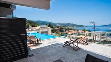 Deluxe Apartment, Sea View | Terrace/patio