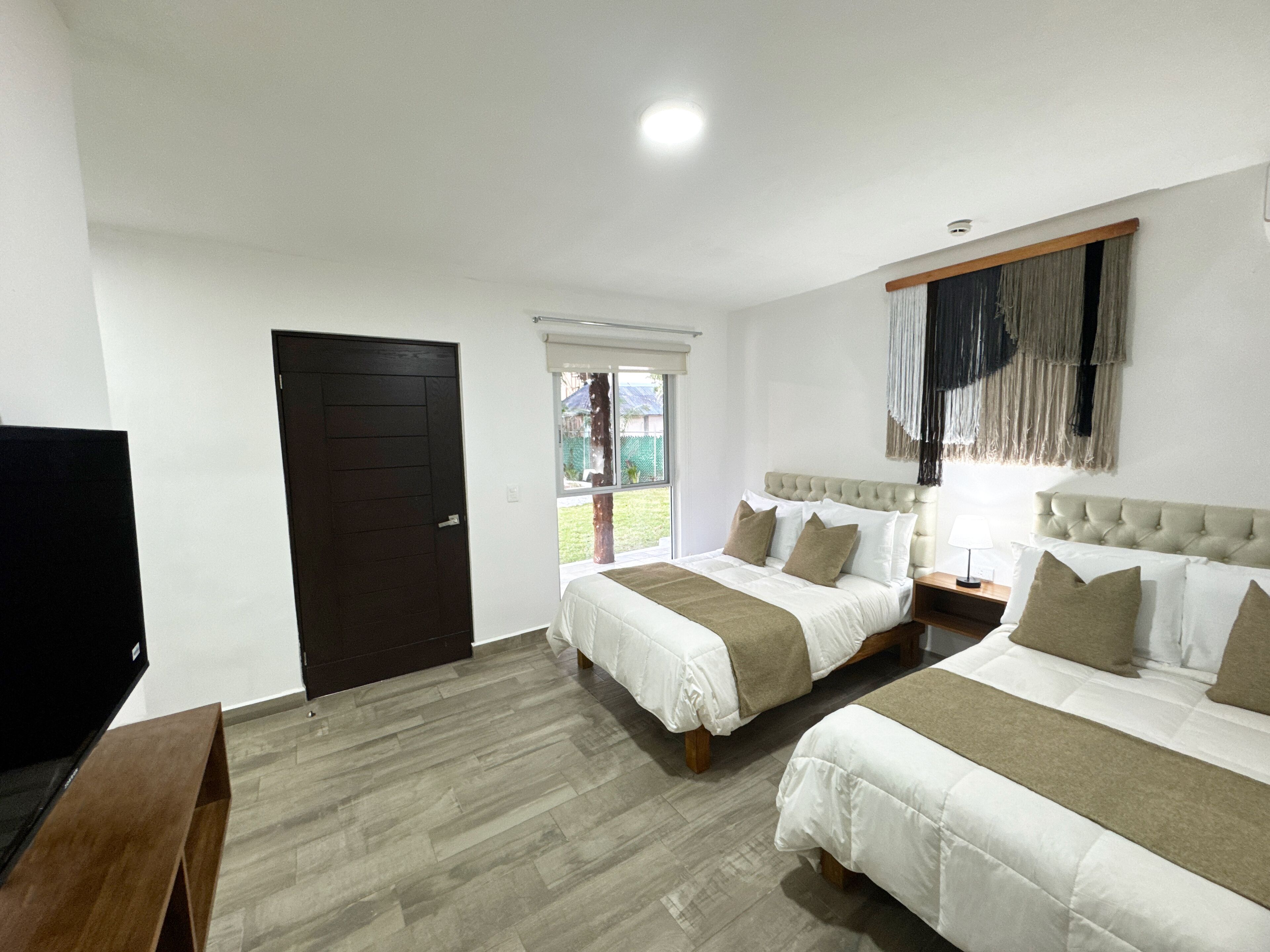 Comfort Room, 2 Double Beds, Garden View | In-room safe, iron/ironing board, free WiFi