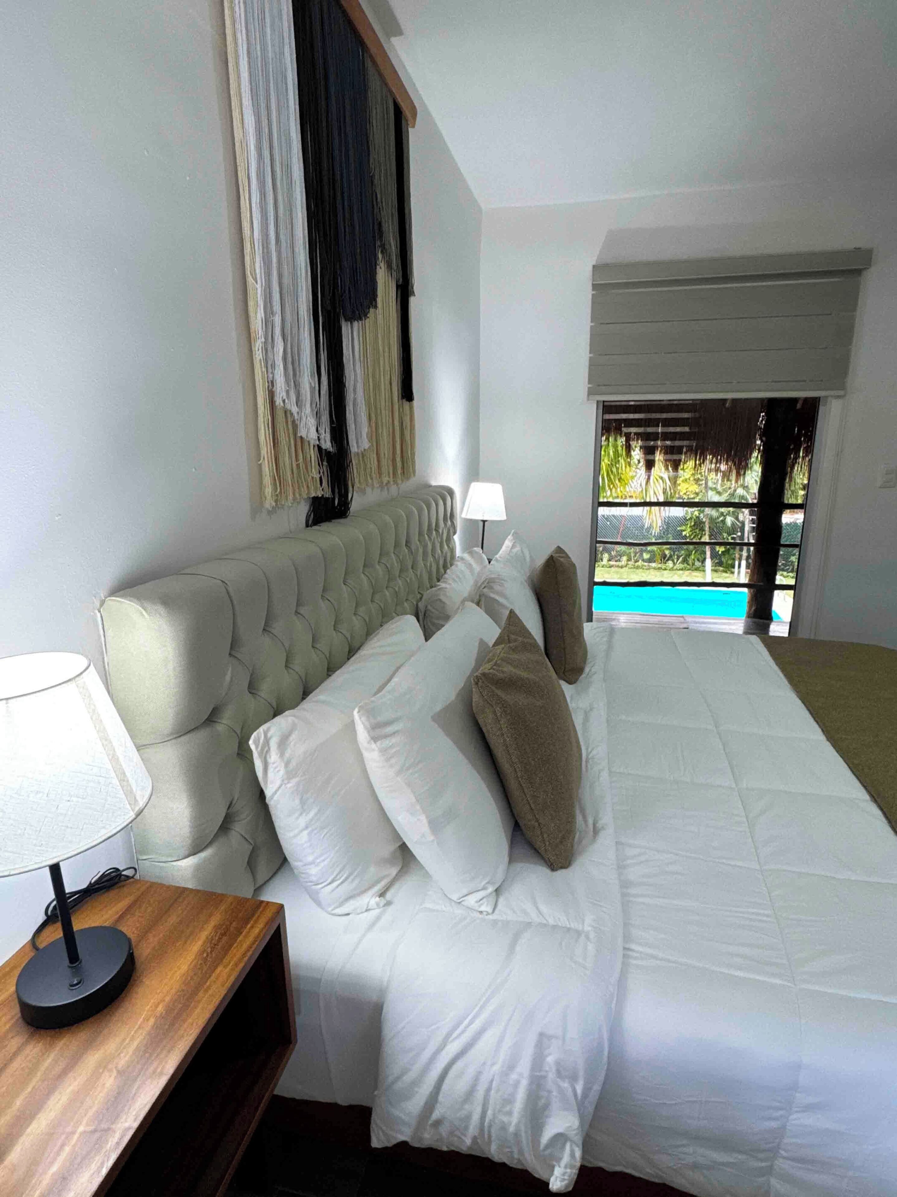 Deluxe Room, 1 King Bed, Balcony, Garden View | Hypo-allergenic bedding, in-room safe, iron/ironing board