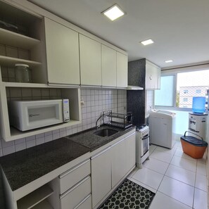 Private kitchen - Apartment in Porto de Galinhas, Paml Village Acqua condominium. (Ipojuca)