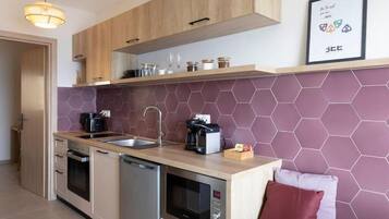 Appartement Deluxe, balcon, vue mer | Cuisine privée