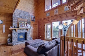 TV, fireplace - Modern Retreat w/ Stunning Views & Hot Tub (Sevierville)