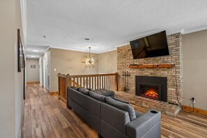 TV, fireplace, video games - Wooded Family Retreat w/ Hot Tub & Games (Gatlinburg)