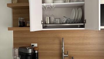 Fridge, microwave, stovetop, coffee/tea maker