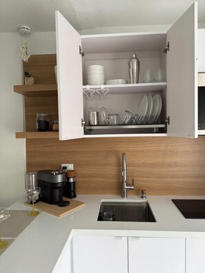 Fridge, microwave, stovetop, coffee/tea maker