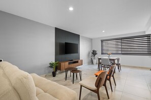 Appartement Luxe | Salle de séjour | Télévision à écran plat