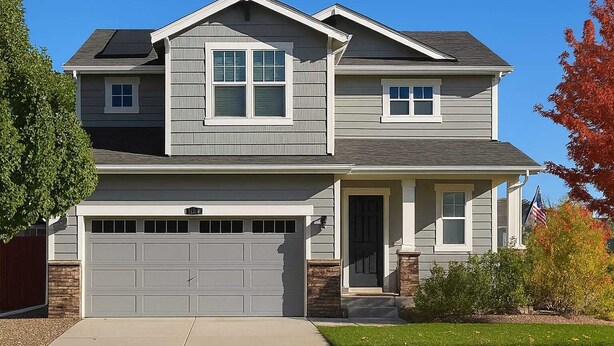 A two-story house with a garage, a front porch, and a small entryway. - 5B4B in Parker w/ Game Room, Fenced Yard & Garage (Parker)