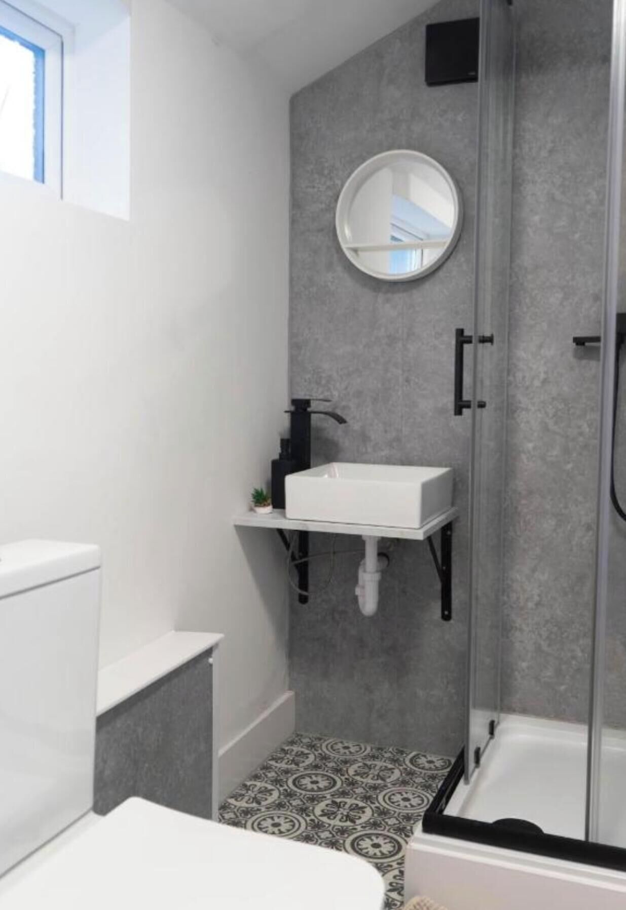 Shower, towels, toilet paper