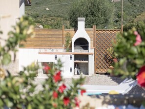 Property grounds - One-bedroom apartment with garden & Lacona view (Lacona)