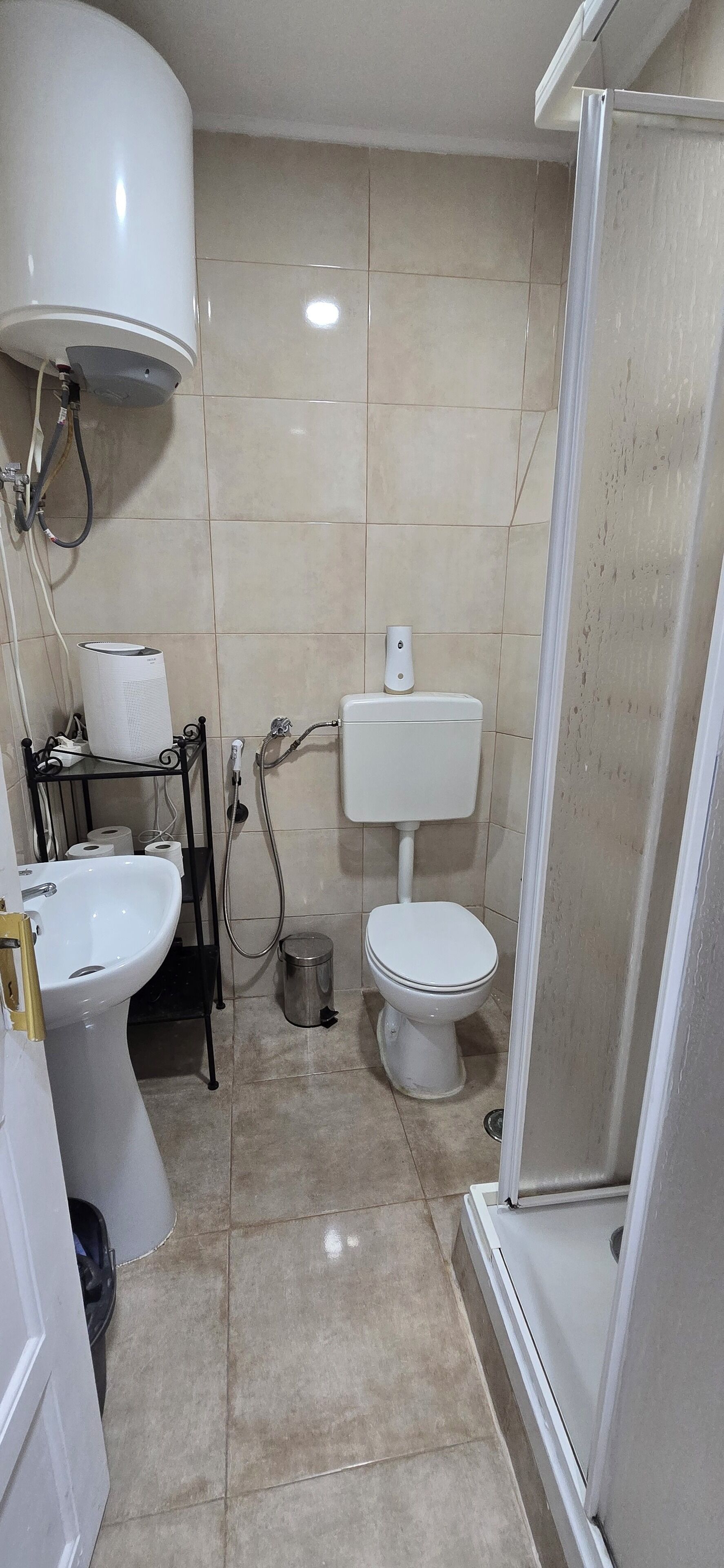 Hair dryer, towels, soap, toilet paper