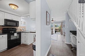 Fridge, microwave, oven, stovetop - Cozy Coastal Retreat just steps from the Beach! (pensacola beach)