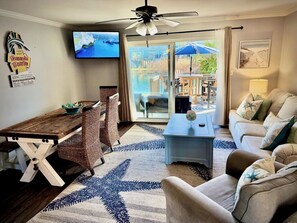 Living area - Cozy Coastal Retreat just steps from the Beach! (pensacola beach)