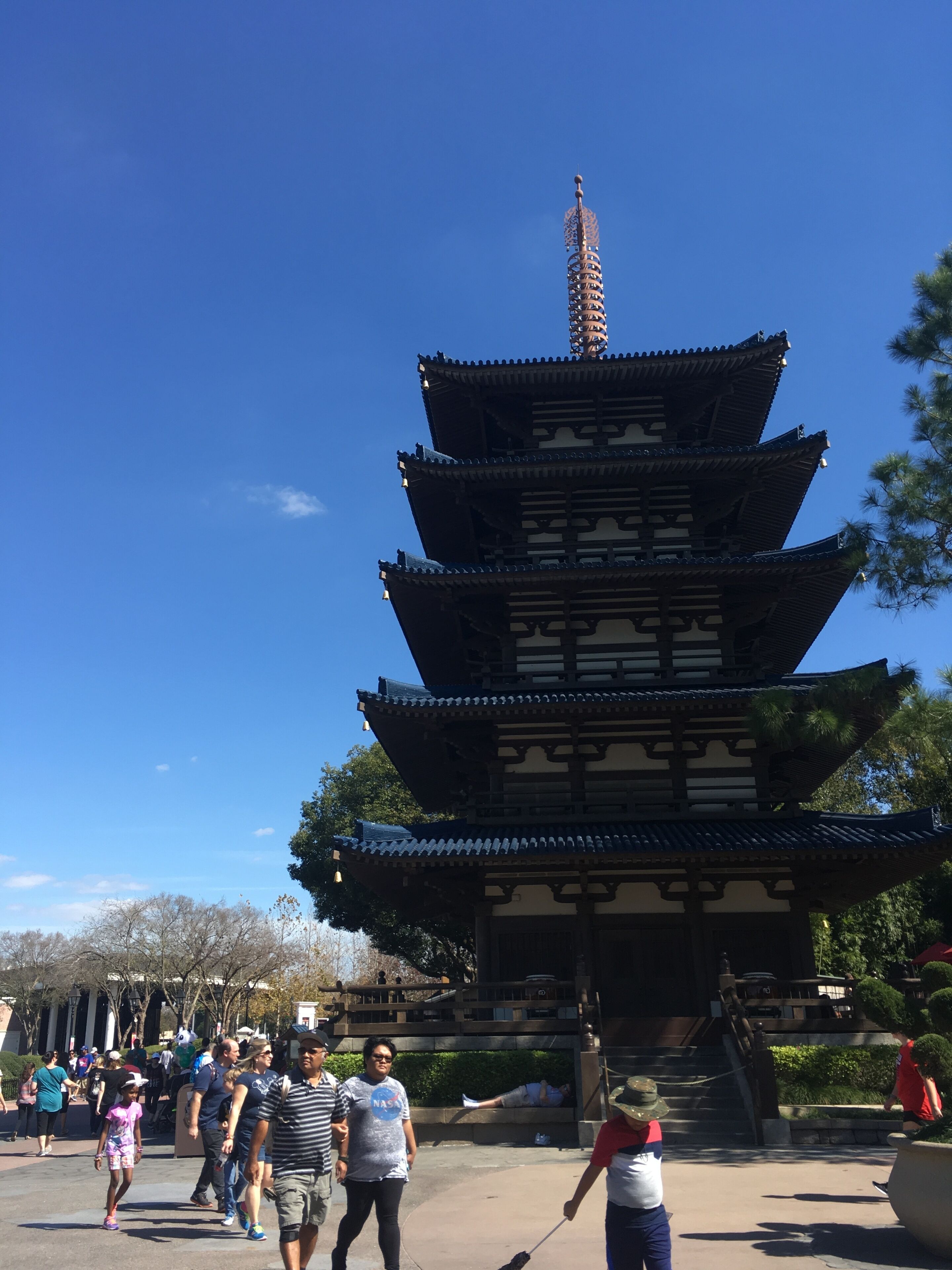 A traditional multi-tiered pagoda with a clear sky in the background.