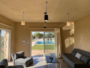 Panoramic Studio, Balcony, Pool View | Living area - Domaine de Filia (Aalali)