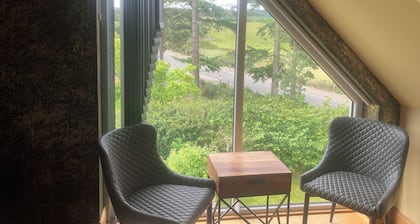Kick back and relax in this calm, stylish with views of beautiful Strathnairn.