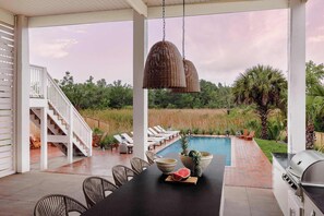 Outdoor dining - Luxurious Coastal Home | Heated Pool (Bay St. Louis)