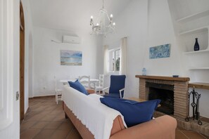 TV, fireplace - Rural House 'Casas Pepe 2' with Private Terrace, Wi-Fi, and Air Conditioning (Los Caños de Meca)