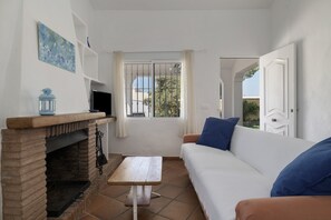 TV, fireplace - Rural House 'Casas Pepe 2' with Private Terrace, Wi-Fi, and Air Conditioning (Los Caños de Meca)