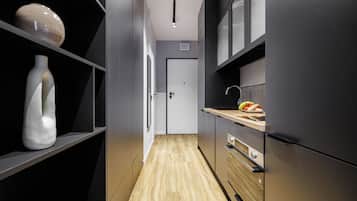 Suite estudio clásica, balcón | Cocina privada | Refrigerador, parrilla de estufa y utensilios de cocina