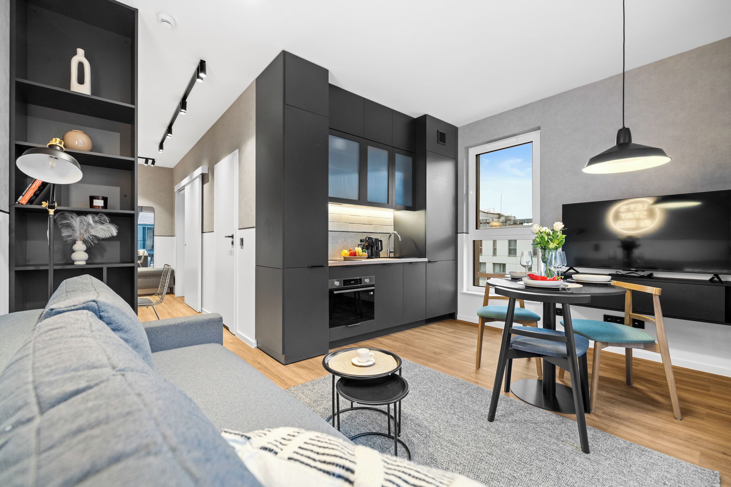 Departamento Confort, balcón | Área de sala de estar