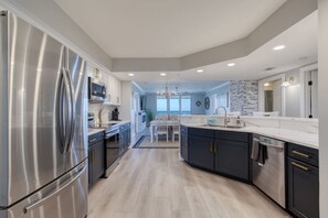 Fridge, microwave, oven, stovetop - Salty Oceanfront Luxury Condo | Pools & Hot Tubs (Daytona Beach)