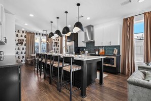 Fridge, microwave, oven, stovetop - City Views | Rooftop Deck | Fire Pit + Grill (Nashville)