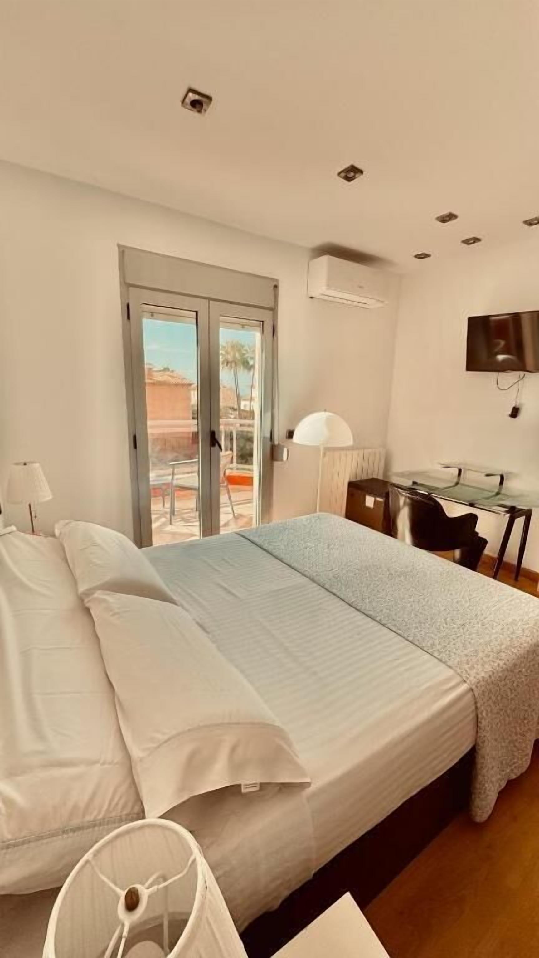 Standard Room, Shared Bathroom, Partial Ocean View (#5) | Iron/ironing board, free WiFi