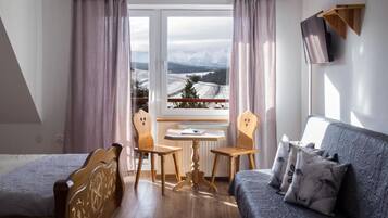 Apartment, Balcony, Mountain View | Laptop workspace, iron/ironing board