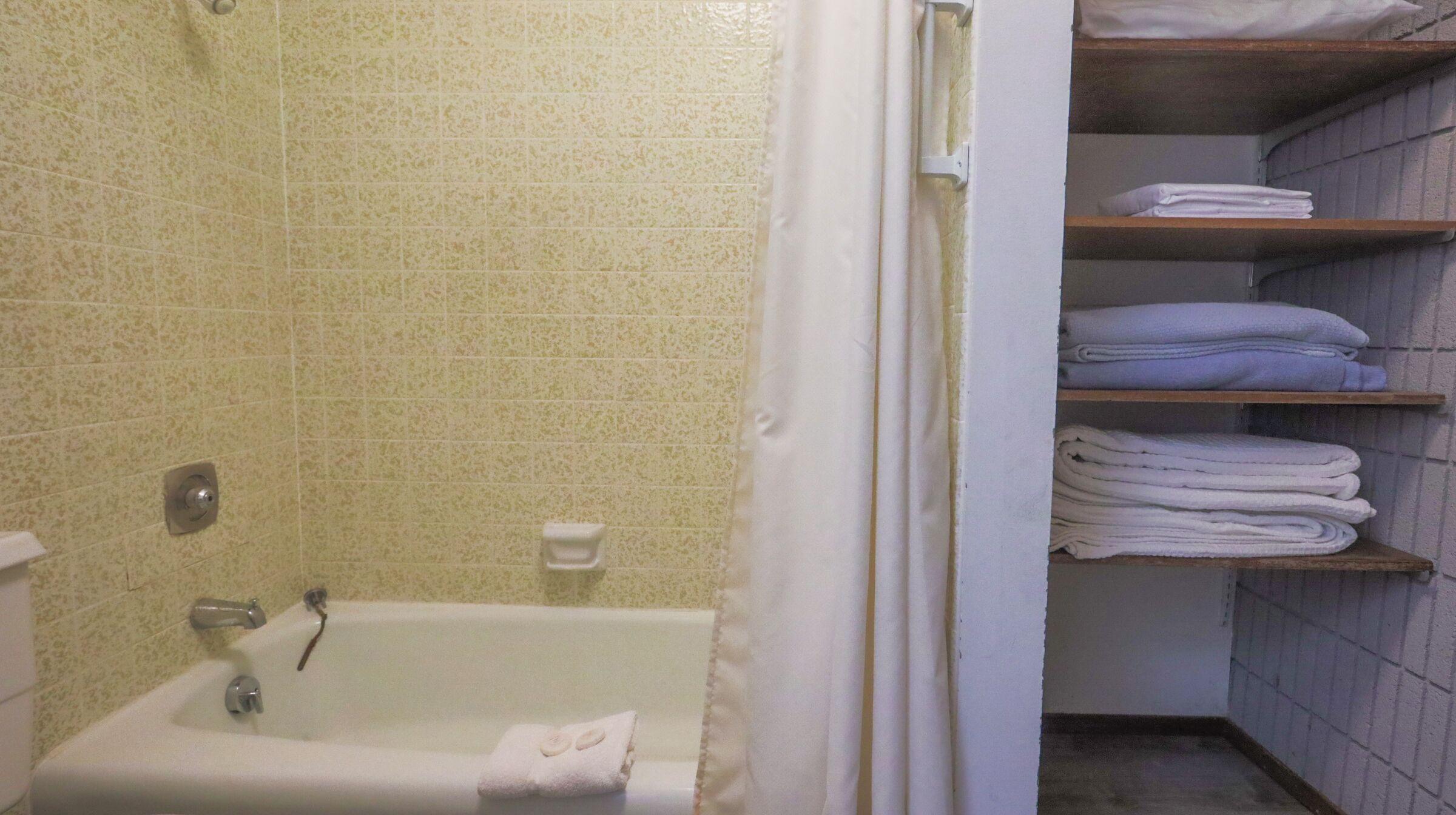 Hair dryer, towels, soap, toilet paper