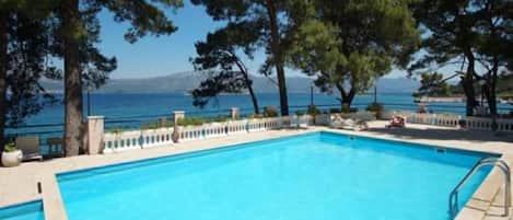 Seasonal outdoor pool, sun loungers