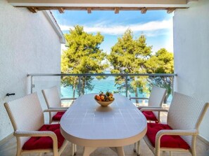 Apartemen Comfort, 1 kamar tidur, pemandangan laut | Tempat makan outdoor