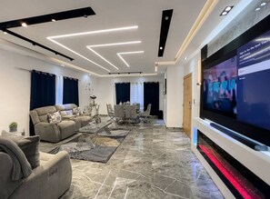Living area - Luxury 2BR • Private Pool & Patio Oasis (Santo Domingo Este)