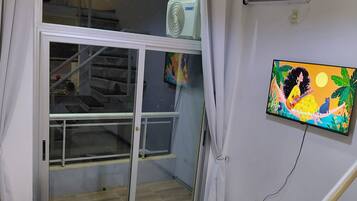 1 chambre, fer et planche à repasser, accès au Wi-Fi (inclus)