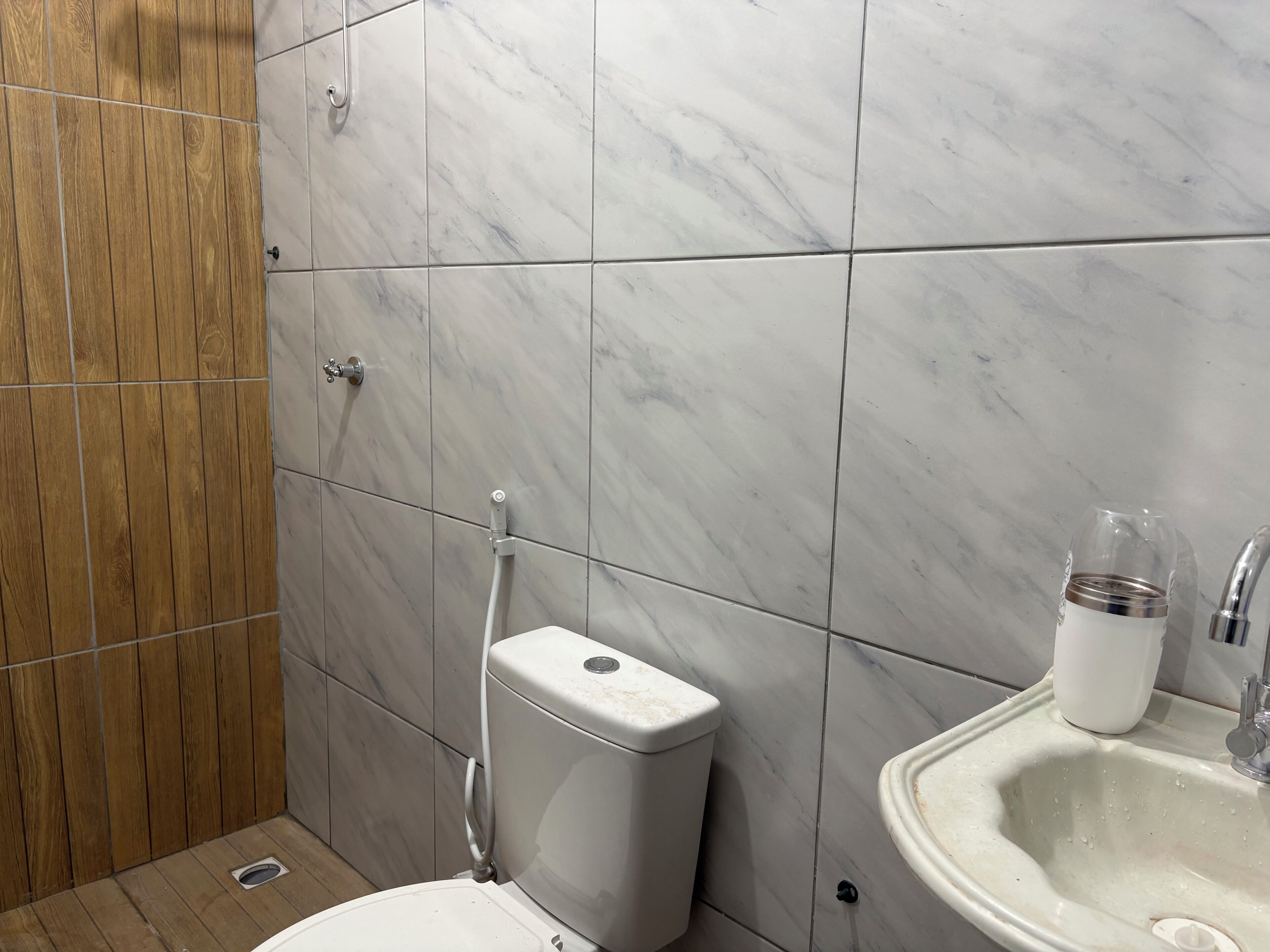 Shower, towels, soap, toilet paper