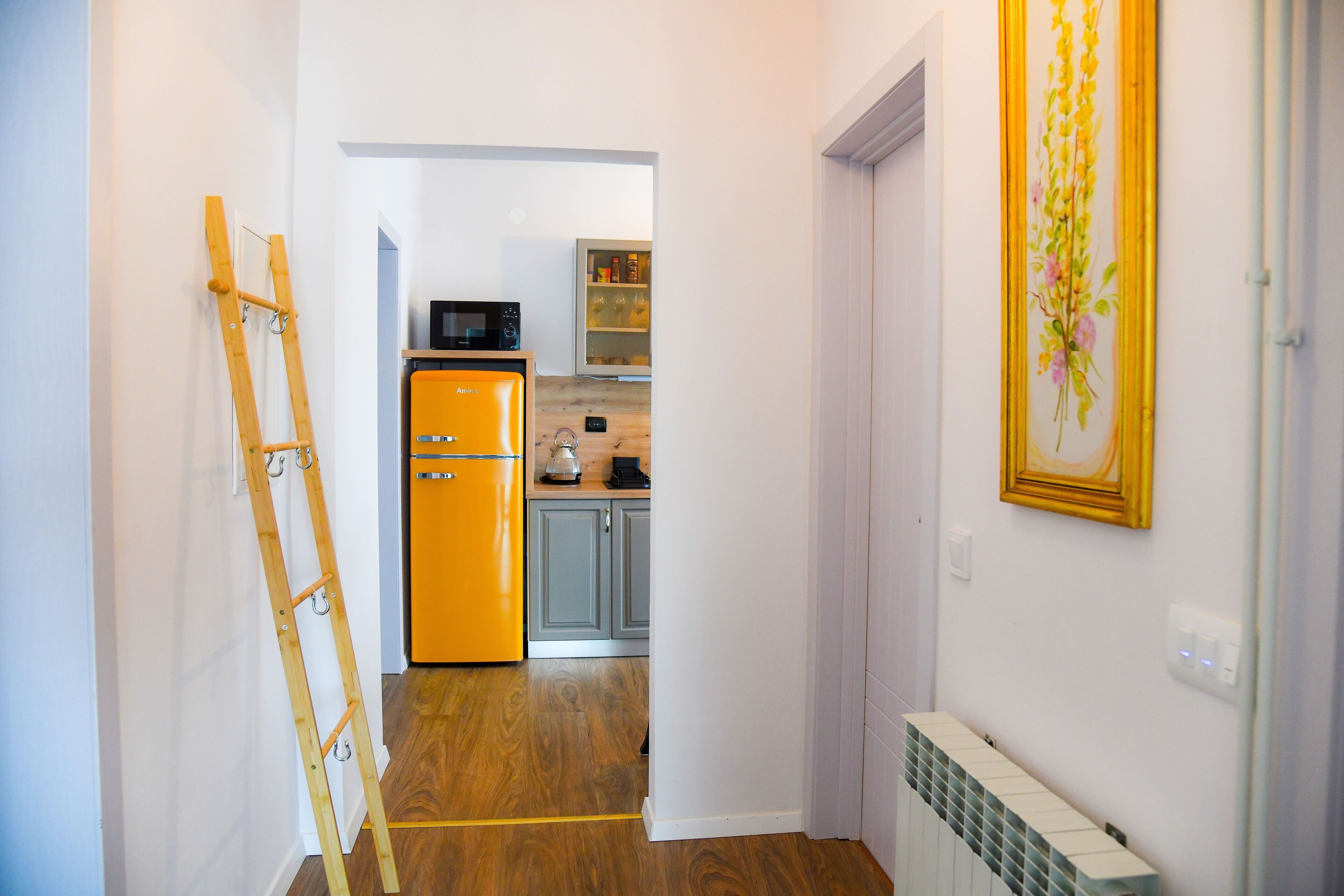 Fridge, microwave, stovetop, coffee/tea maker