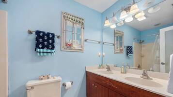 Hair dryer, towels, soap, shampoo