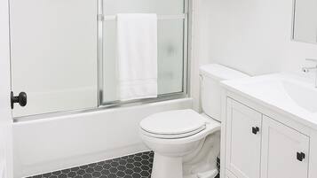 Hair dryer, towels, soap, shampoo