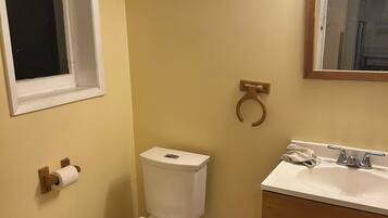 Hair dryer, towels, soap, toilet paper