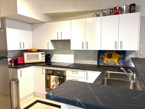 Private kitchen - Stylish City Apartment. Close to City, Oxford St, Restaurants and Nightlife. (Darlinghurst)