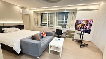 Executive Studio Suite, City View | Desk, laptop workspace, blackout curtains, free WiFi