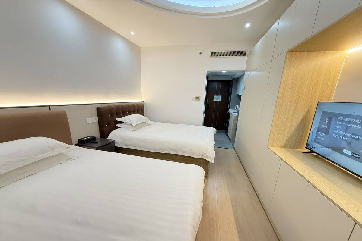 Executive Twin Room, City View | Desk, laptop workspace, blackout curtains, free WiFi