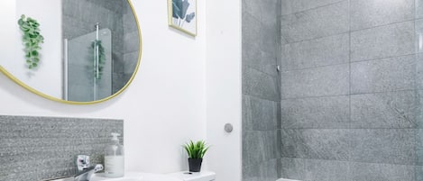 Hair dryer, towels, soap, shampoo
