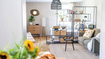 1 habitación, tabla de planchar con plancha y cuna de viaje
