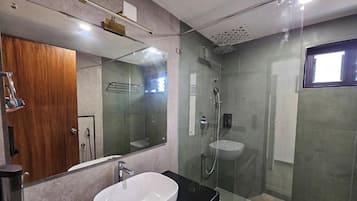 Shower, free toiletries, towels, soap