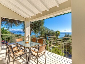 Outdoor dining - "Villa Nafsika" by Interhome (Kalami)