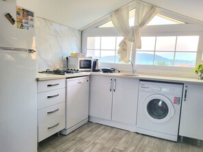 Fridge, microwave, dishwasher, cookware/dishes/utensils