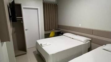 Desk, laptop workspace, blackout drapes, soundproofing